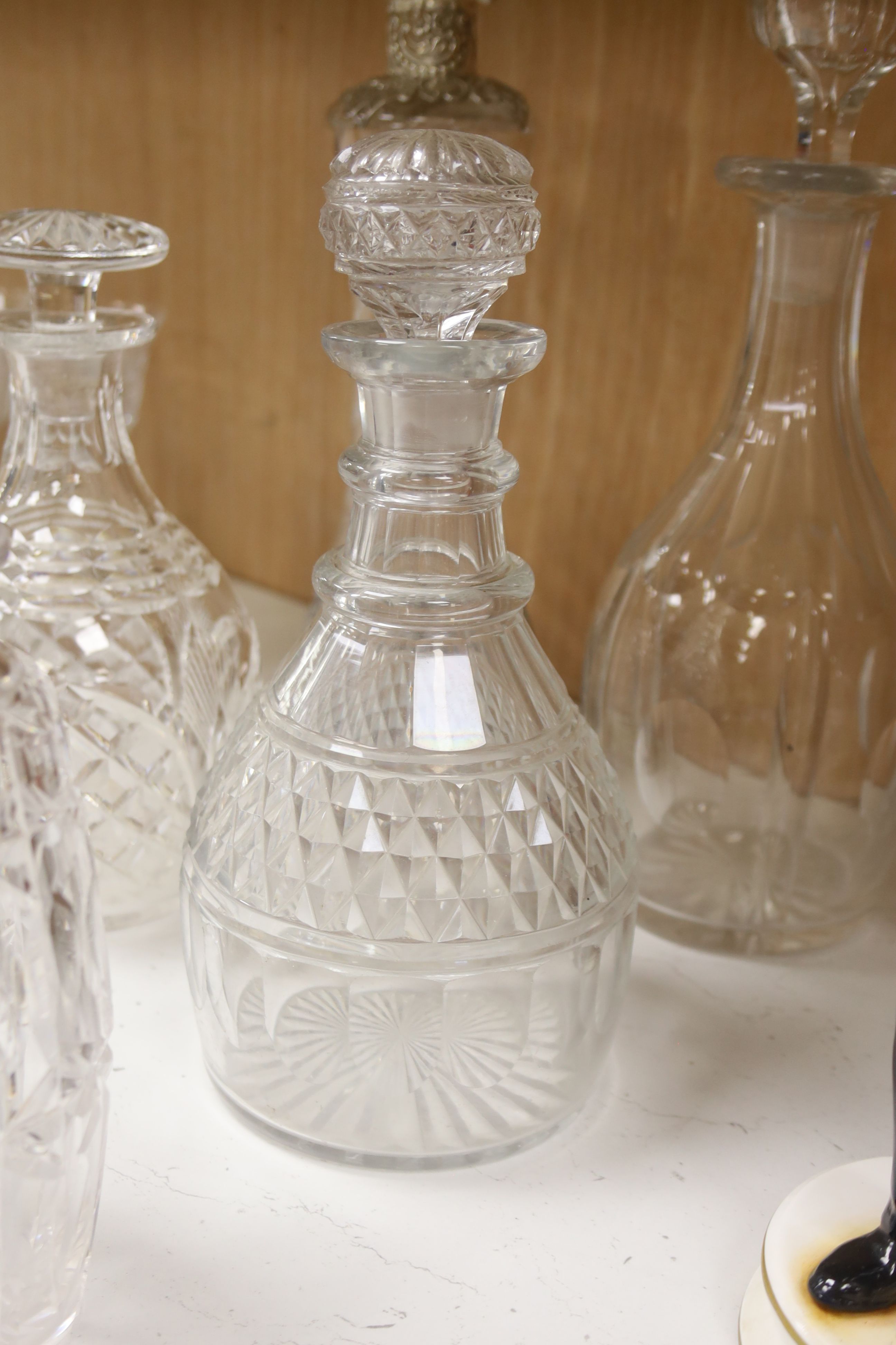 A cut glass punch bowl and a collection of table glassware, to include a late Victorian silver mounted decanter (lacking stopper)